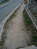 Missing sidewalk with worn foot path - Kalamazoo