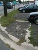 Debris lined sidewalk that ends - Kalamazoo St.