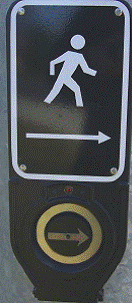 Push button integrated Accessible Pedestrian Signals (APS).